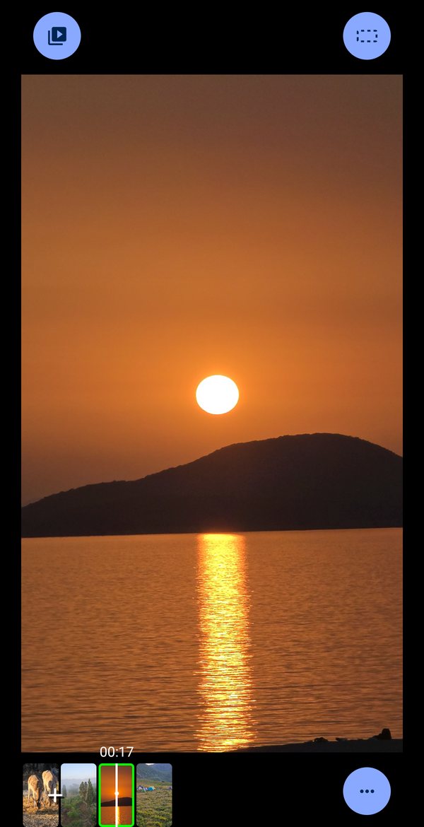 The editor, a sunset filling the frame, with the filmstrip along the bottom